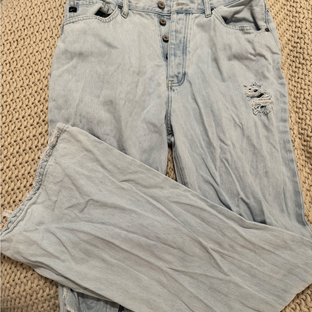 KanCan light wash flare jeans. Distressed.